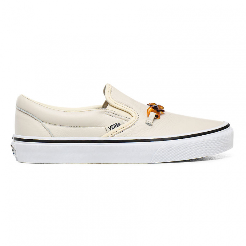ladies white slip on vans